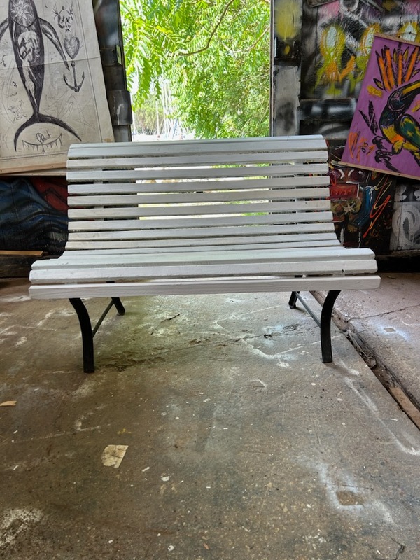 Outdoor bench made of wood and wrought iron