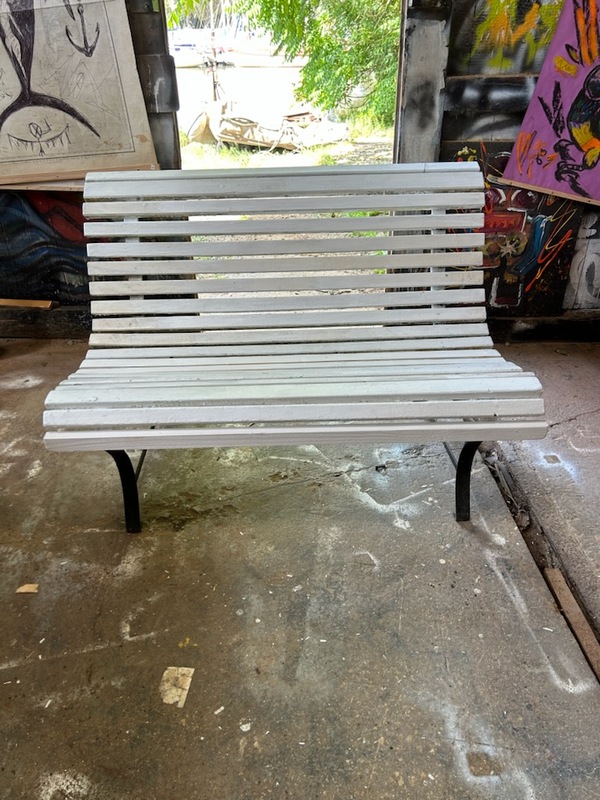 Outdoor bench made of wood and wrought iron