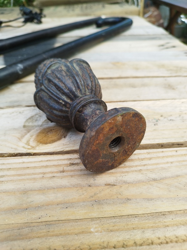 Pine cone staircase ball 