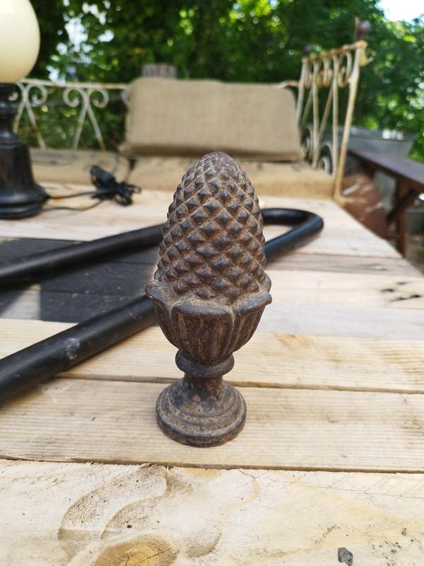 Pine cone staircase ball 