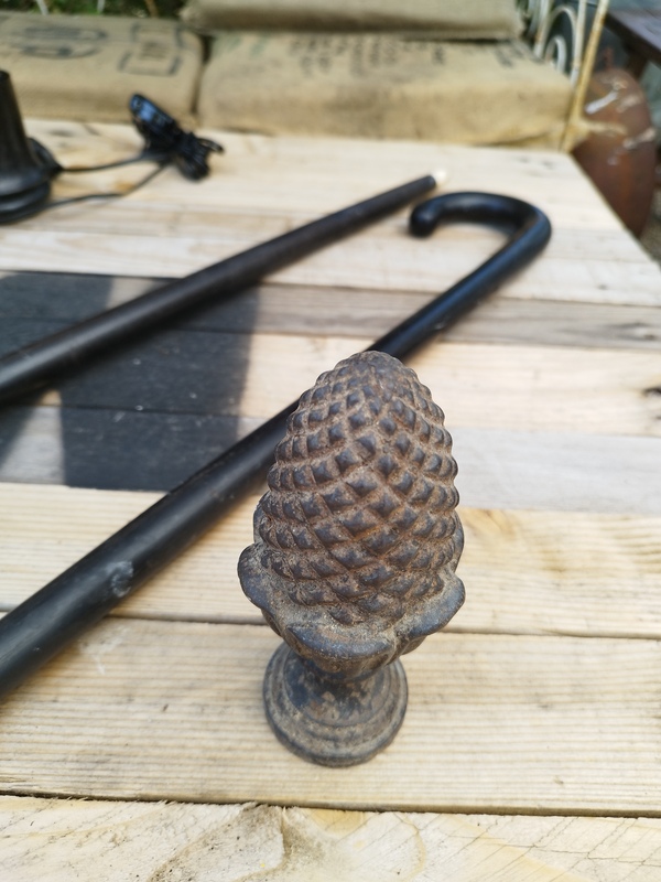 Pine cone staircase ball 