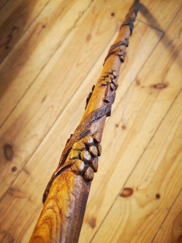 Folk art cane with vine motifs