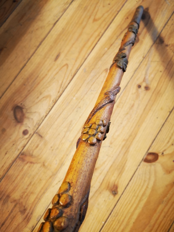 Folk art cane with vine motifs