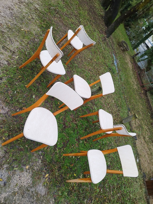 Set of six wood and white skai chairs