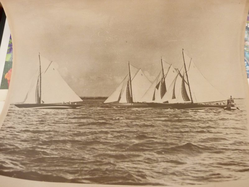Old photograph of black and white sailboat