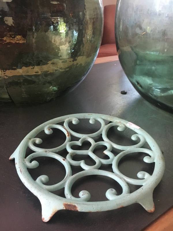 Old enamelled cast iron trivet