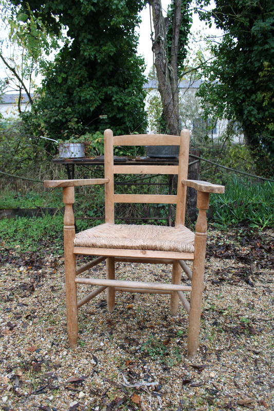 Wooden straw armchair