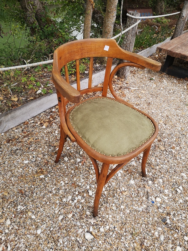 Curved wood armchair