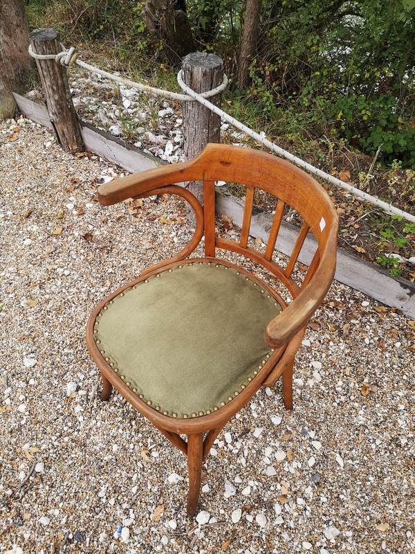 Curved wood armchair