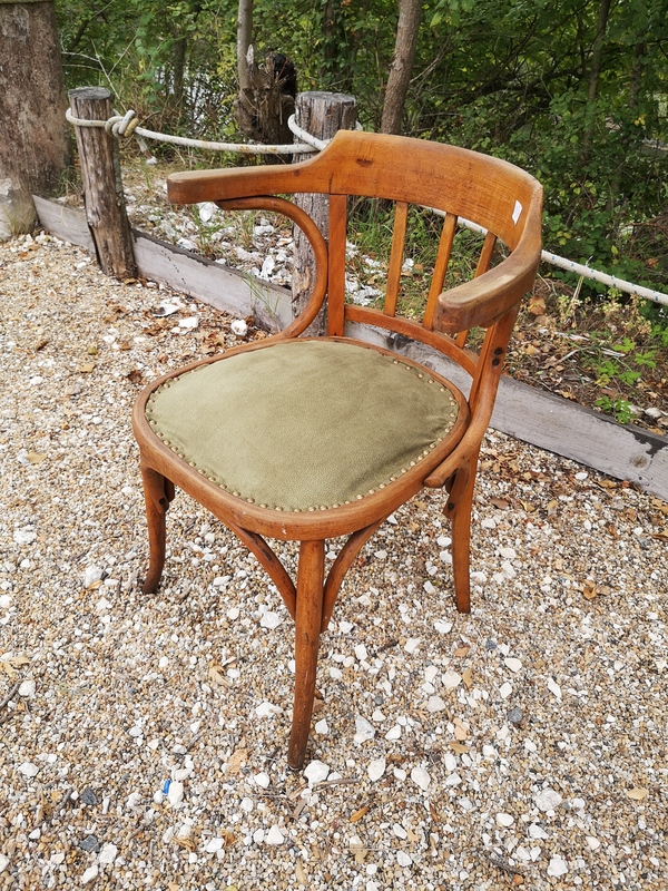 Curved wood armchair