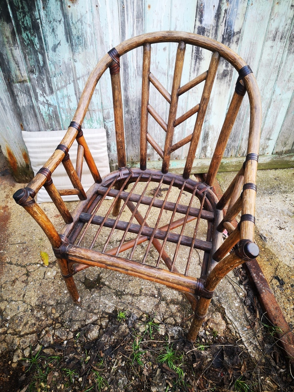 Rattan and leather armchair
