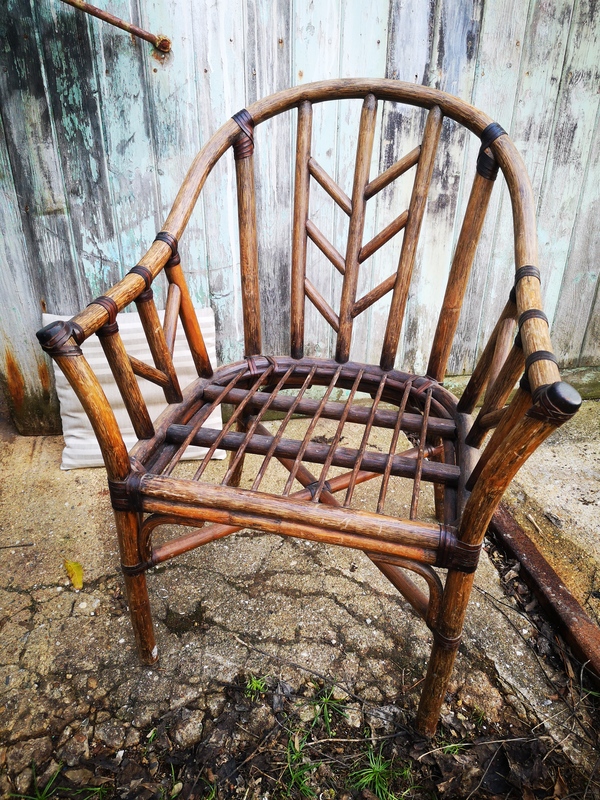 Rattan and leather armchair