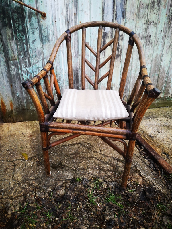 Rattan and leather armchair