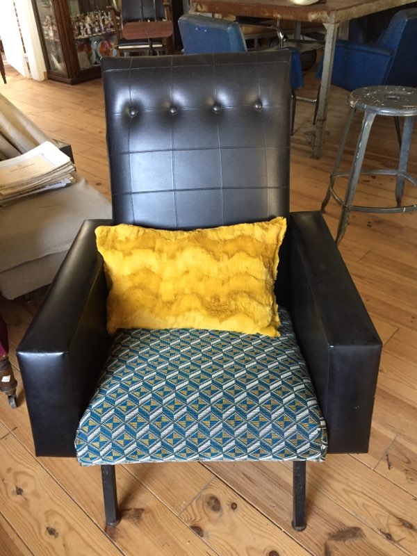 Upholstered black leather chair
