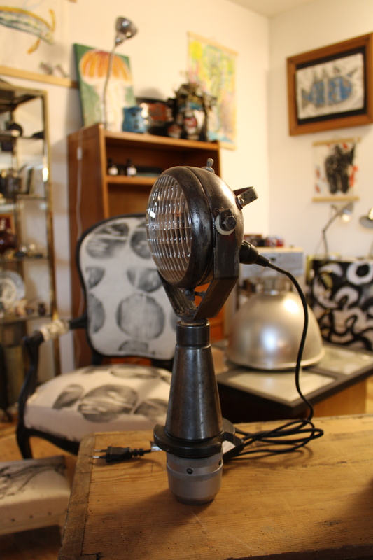 Old lighthouse lamp on industrial forest