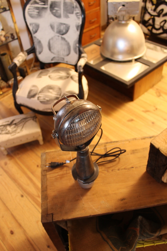 Old lighthouse lamp on industrial forest