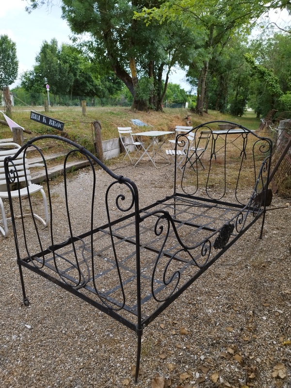 Old art deco wrought iron bed