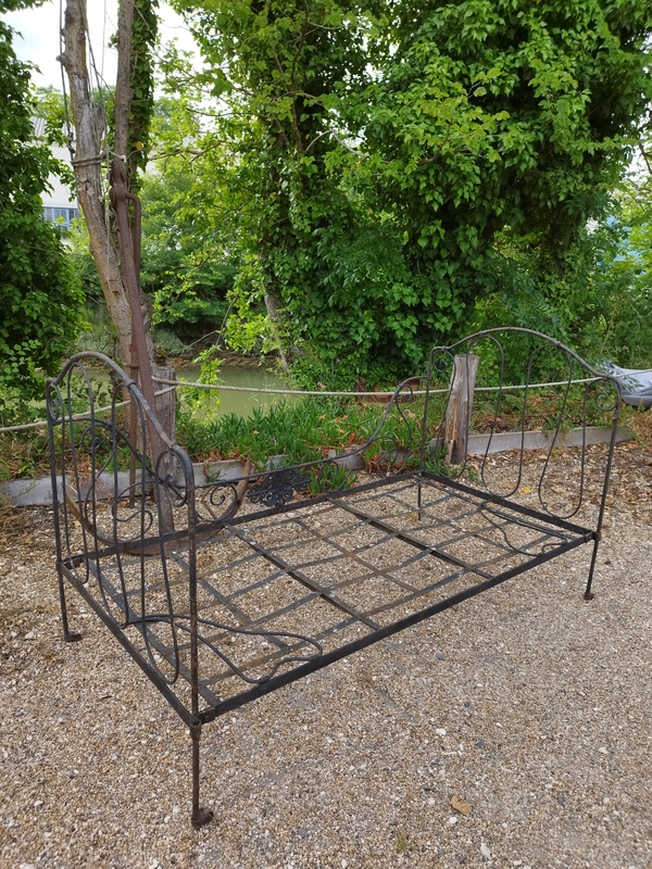 Old art deco wrought iron bed