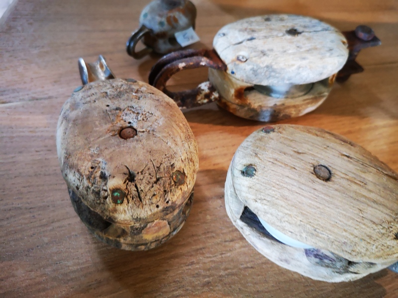 Lot of small wooden pulleys