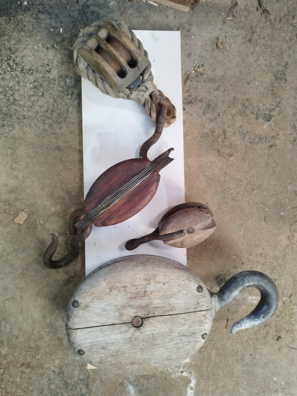 Lot of antique pulleys 