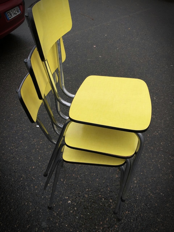 Lot of yellow formica chairs 60s