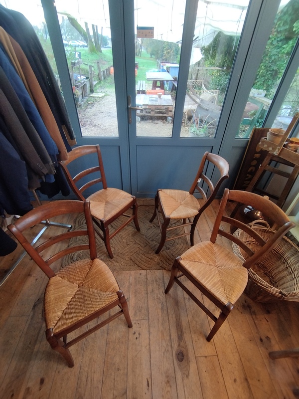  Set of four early 20th-century chairs made of wood and straw
