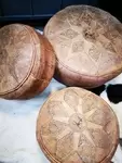 70s leather poufs