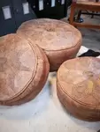 70s leather poufs