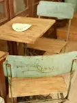 A bistro table and two chairs