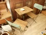 A bistro table and two chairs
