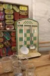 Antique enameled sheet metal ladle holder and drainer