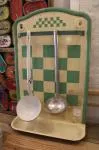 Antique enameled sheet metal ladle holder and drainer