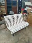 Outdoor bench made of wood and wrought iron