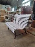 Outdoor bench made of wood and wrought iron