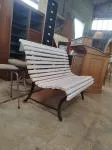 Outdoor bench made of wood and wrought iron