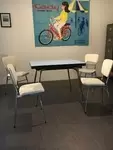 Blue formica table and four skai chairs