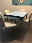 Blue formica table and four skai chairs