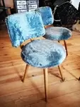 Wooden chair and blue toupee
