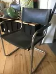Chrome and leather armchairs