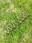 Coat rack in varnished rattan