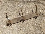 Coat rack with three hooks