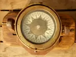 Compass on its wooden base