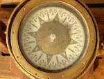 Compass on its wooden base