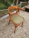 Curved wood armchair