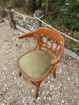 Curved wood armchair