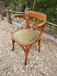 Curved wood armchair