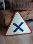 Enamelled road sign