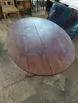 Folding oval table