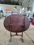 Folding oval table