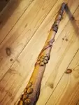 Folk art cane with vine motifs